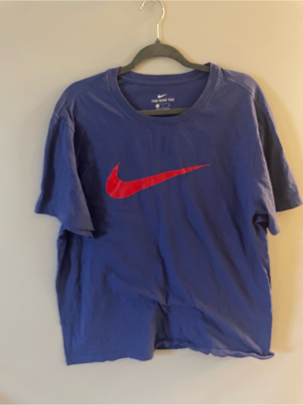 Nike men’s Short-Sleeve Blue Tee with Red Swoosh